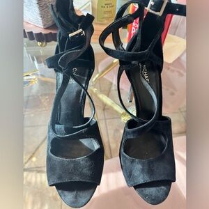 Michael Kors heels in size 7. Great condition, worn one time! Black suede.